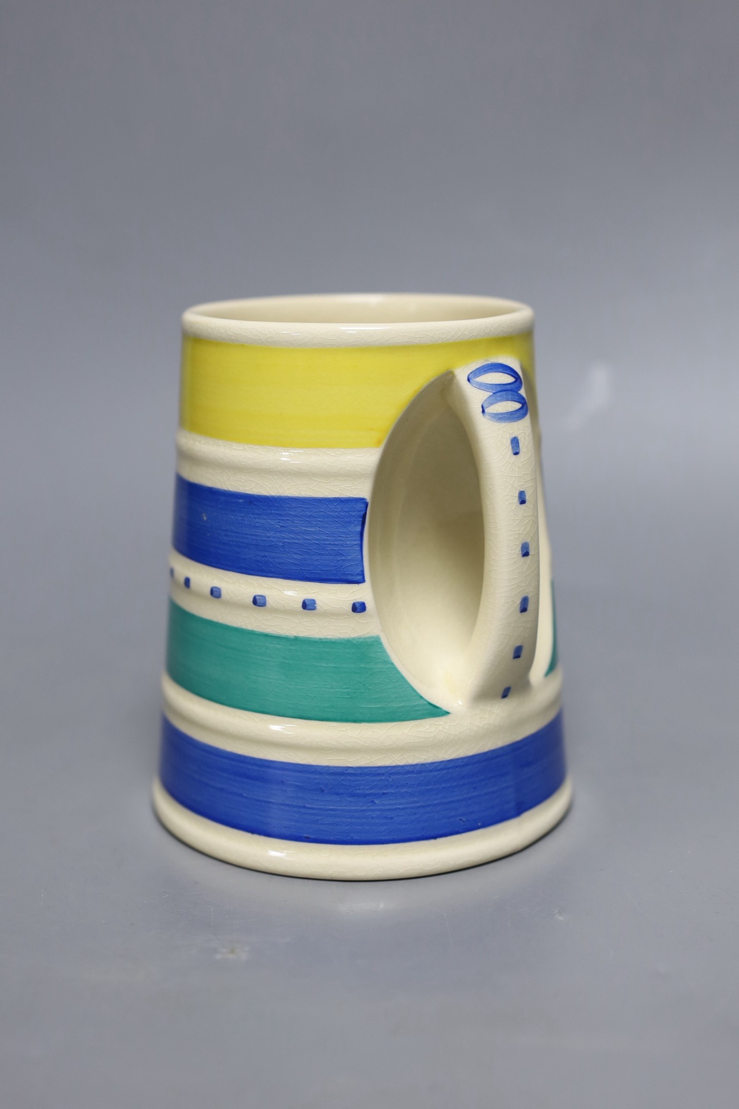 Susie Cooper for Burslem, a banded tankard, 13cm